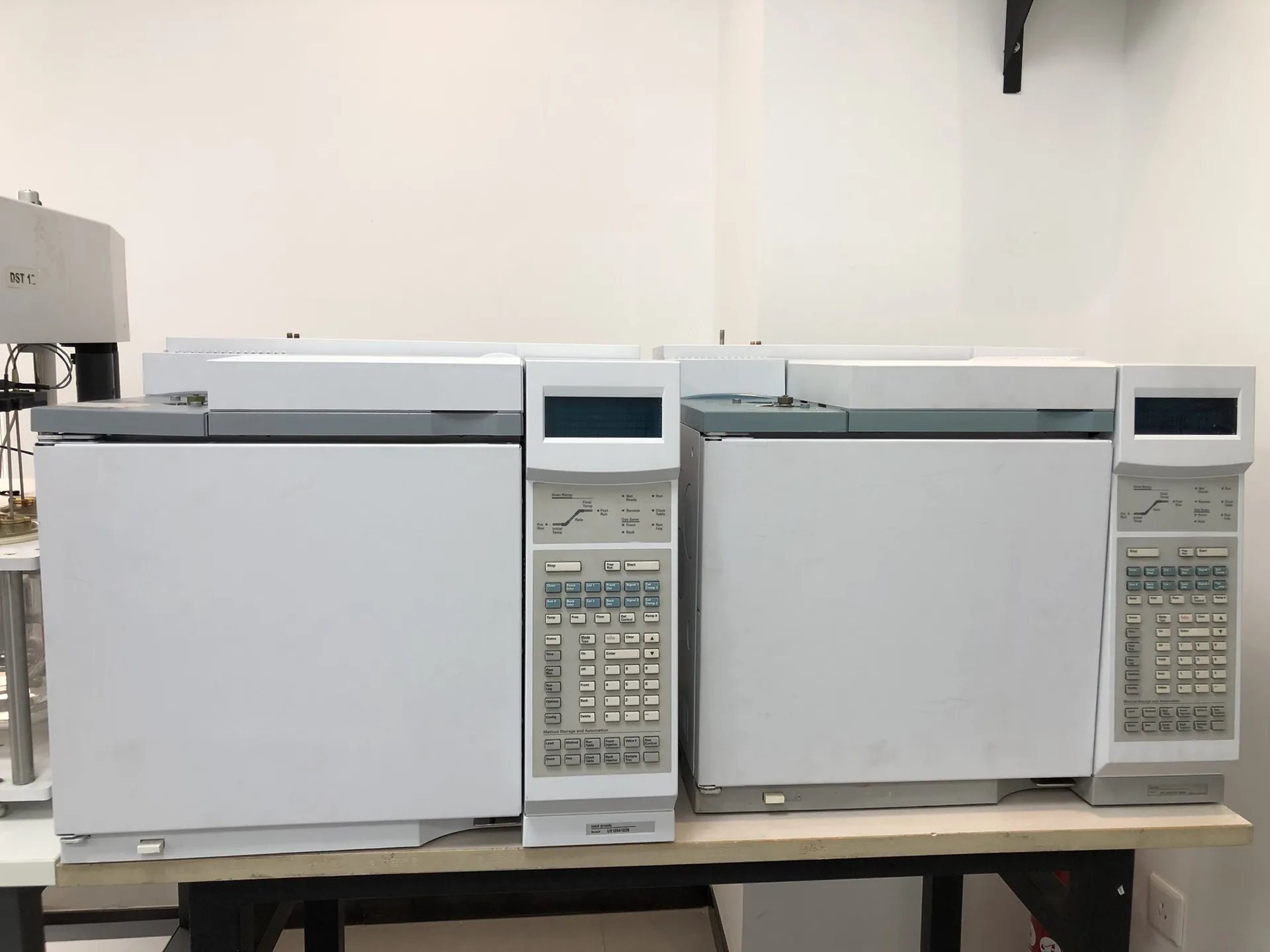 Two refurbished Agilent 6890A GC systems on a laboratory bench